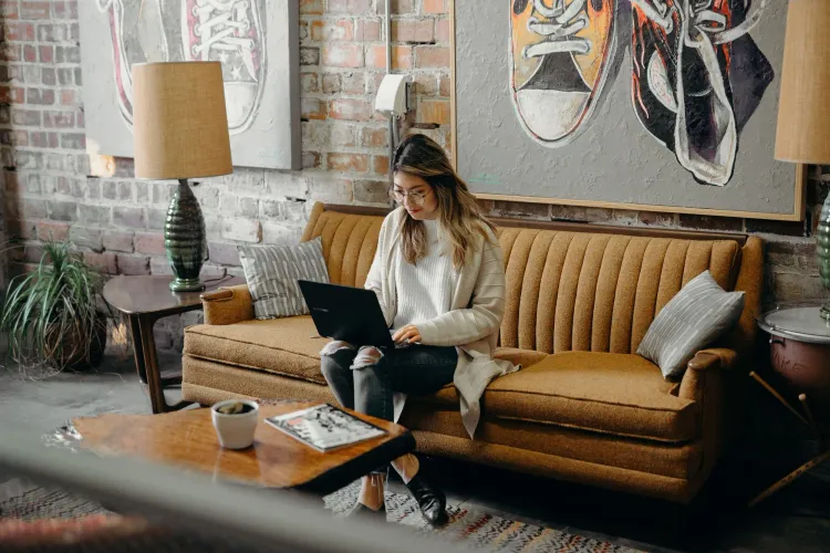 Woman working remotely using a laptop